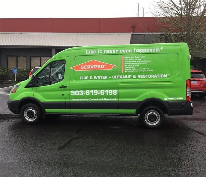 ford van wrapped in SERVPRO logo